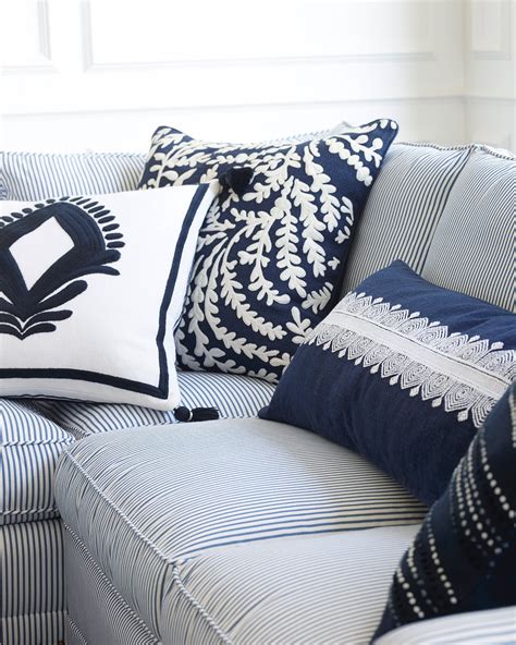 white and navy blue pillows